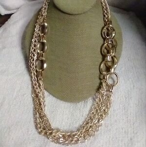 Goldtone circles long chain statement runway necklace